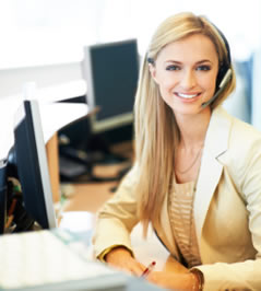 Image of a Receptionist sitting at a desk
